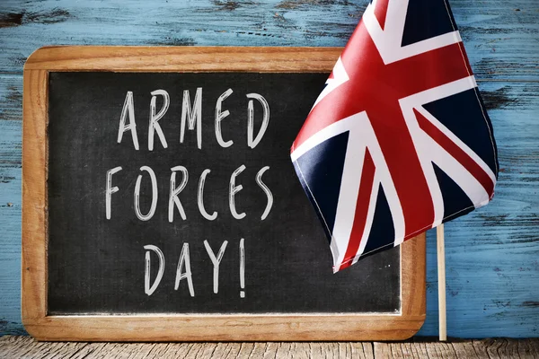 Texto día de las fuerzas armadas y bandera del Reino Unido — Foto de Stock
