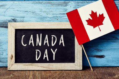 text Canada Day and flag of Canada clipart