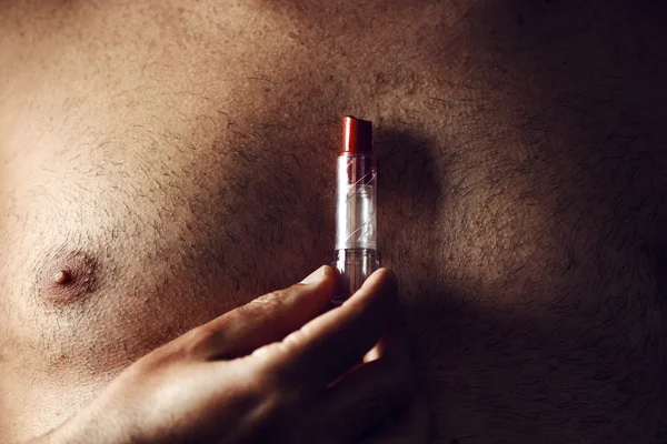 Young man with a red lipstick — Stock Photo, Image