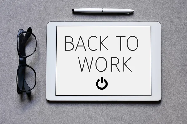 Text back to work in a tablet computer — Stock Photo, Image