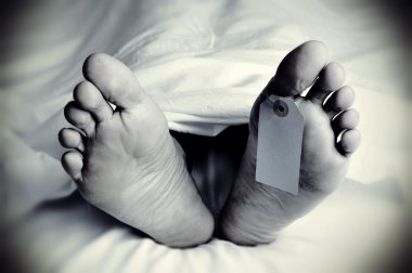 dead body with a blank toe tag, in monochrome clipart