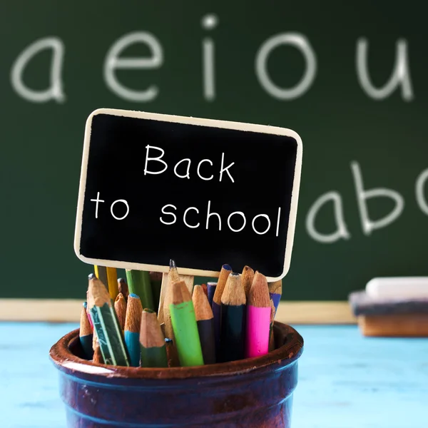 Text back to school on a blackboard — Stock Photo, Image