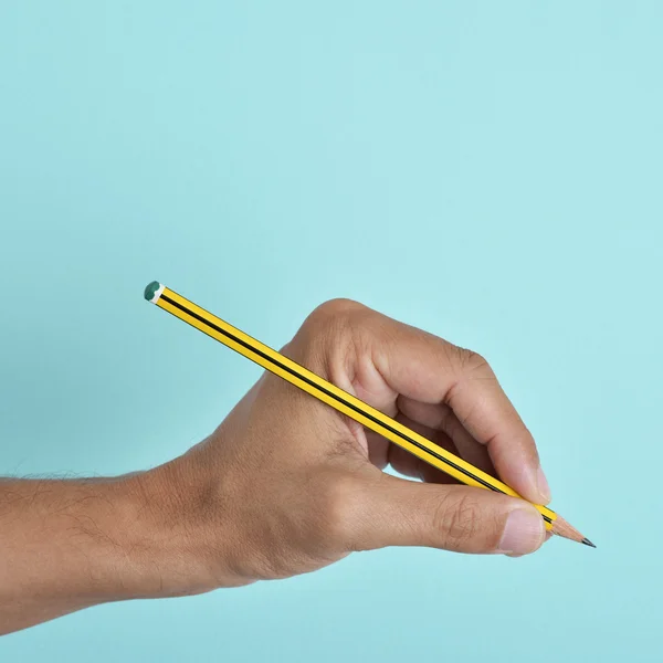 Lefty mannen med en penna — Stockfoto