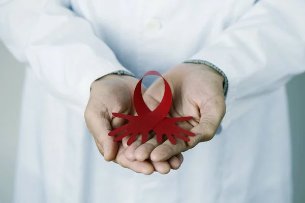 Closeup Doctor Man Wearing White Coat Red Awareness Ribbon Its — Stock Photo, Image