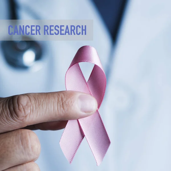 Closeup Doctor Man Wearing White Coat Pink Awareness Ribbon His — Stock Photo, Image