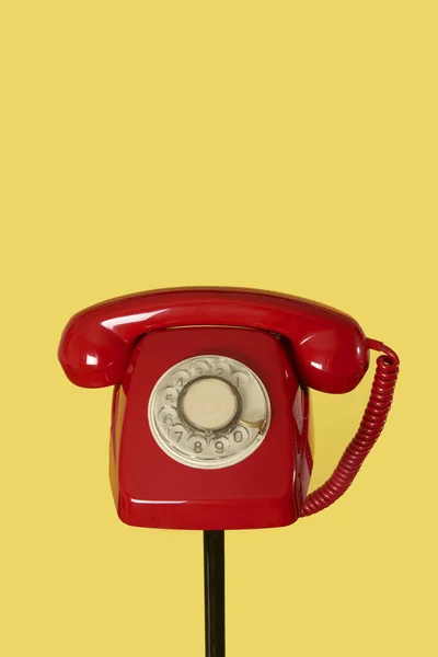 Red Landline Rotary Dial Telephone Top Black Tubular Stand Yellow — Stock Photo, Image