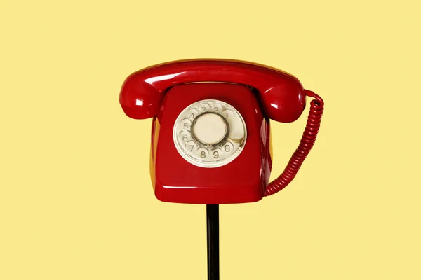 Red Landline Rotary Dial Telephone Top Black Tubular Stand Yellow — Stock Photo, Image