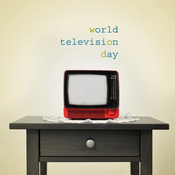 Oude televisie en de zin wereld televisie dag, met een — Stockfoto