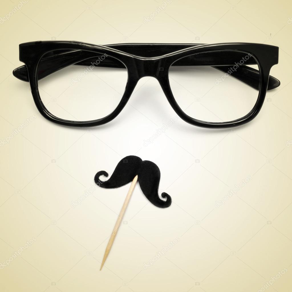 eyeglasses and moustache as a hipster guy, with a retro effect