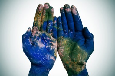 the world in your hands (Earth map furnished by NASA) clipart