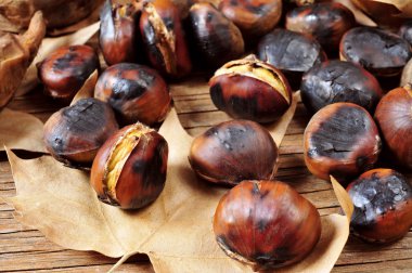 Roasted chestnuts close up clipart