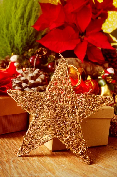 Christmas star on a christmas table — Stock Photo, Image