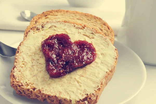 Heart of jam on a toast — Stock Photo, Image