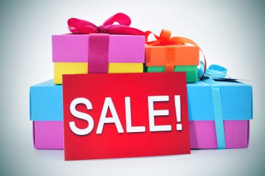 gifts and a red signboard with the word sale clipart