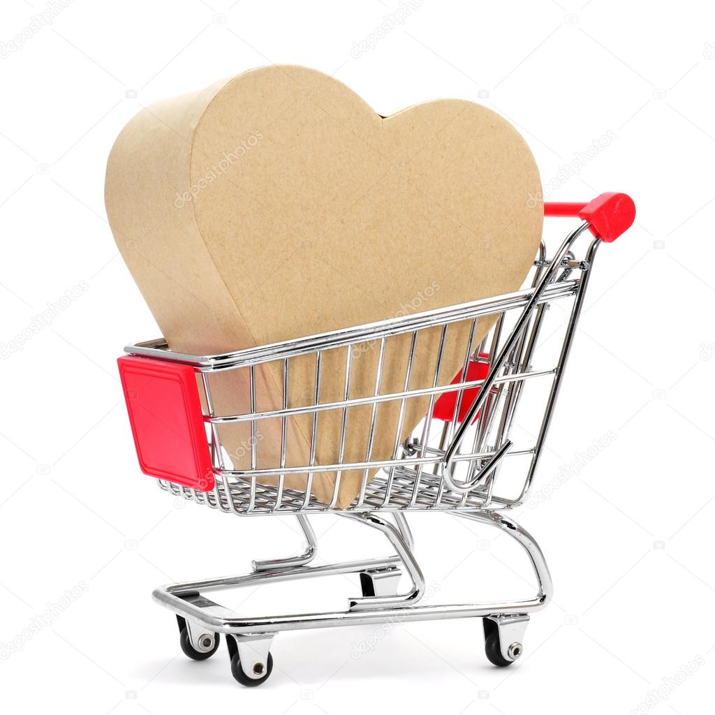 heart-shaped gift box in a shopping cart