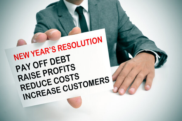 Businessman with a list of new years resolutions
