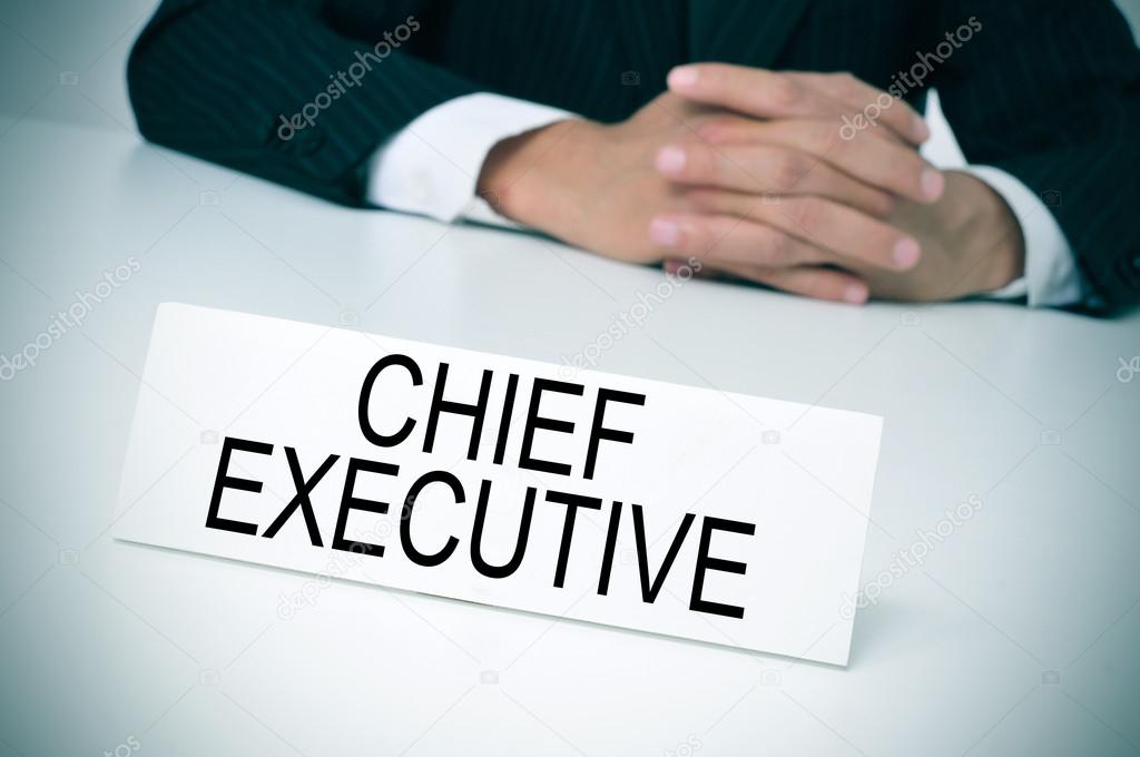 chief executive in his office