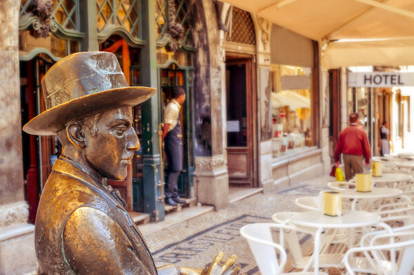 Statue of Fernando Pessoa outside of Cafe A Brasileira