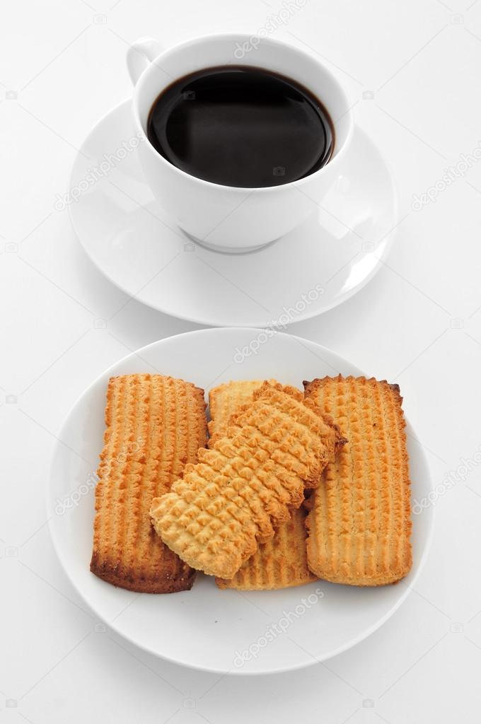 Coffee and biscuits on table
