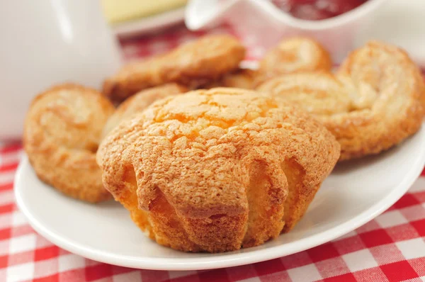 Magdalenas and palmeras, spanish plain muffins and palm trees — Stock Photo, Image