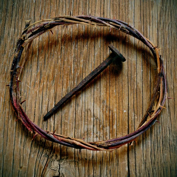 The crown of thorns of Jesus Christ and a nail on the Holy Cross — Stock Photo, Image