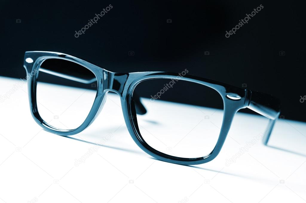 A pair of black plastic-rimmed eyeglasses