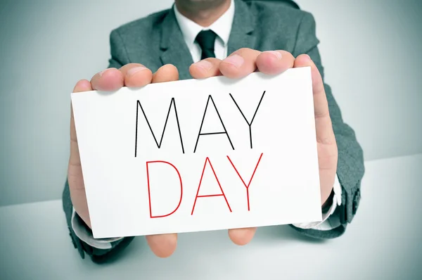 Man showing a signboard with the text may day — Stock Photo, Image