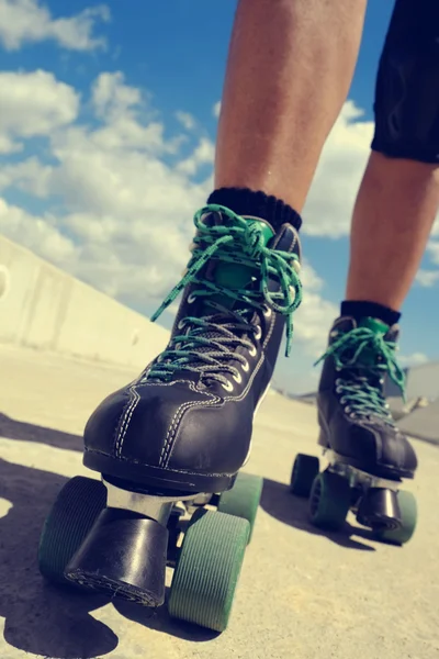 Young man roller skating — Stock Photo, Image