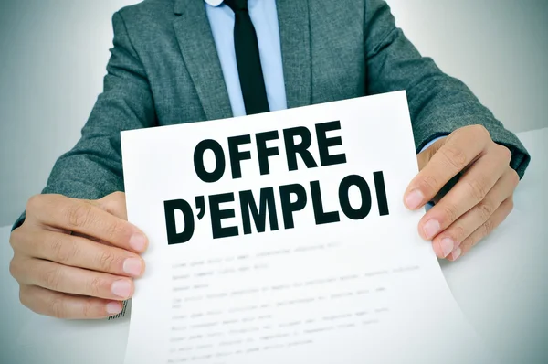 Man with with the text offres d'emploi, jobs in french — Stock Photo, Image