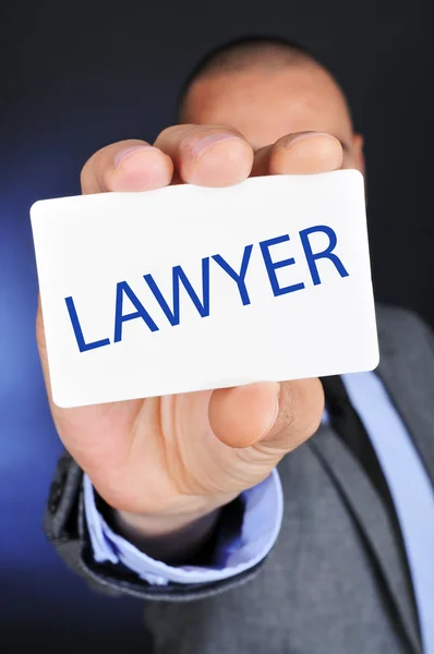 Man showing a signboard with the word lawyer — Stock Photo, Image