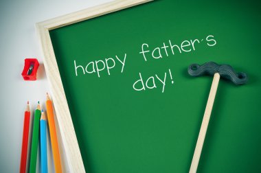 text happy fathers day in a chalkboard clipart