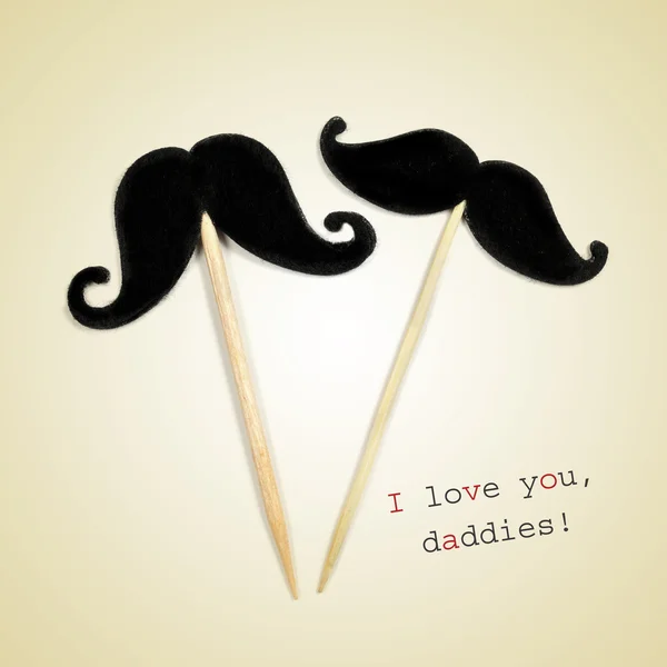Två mustascher och texten jag älskar dig daddies — Stockfoto