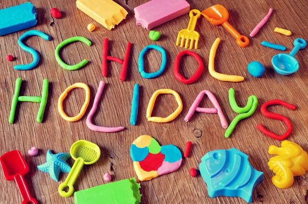 Text school holidays made from modelling clay — Stock Photo, Image