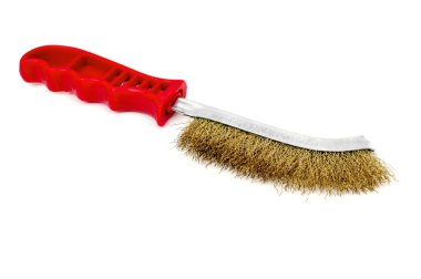 a wire brush on a white background