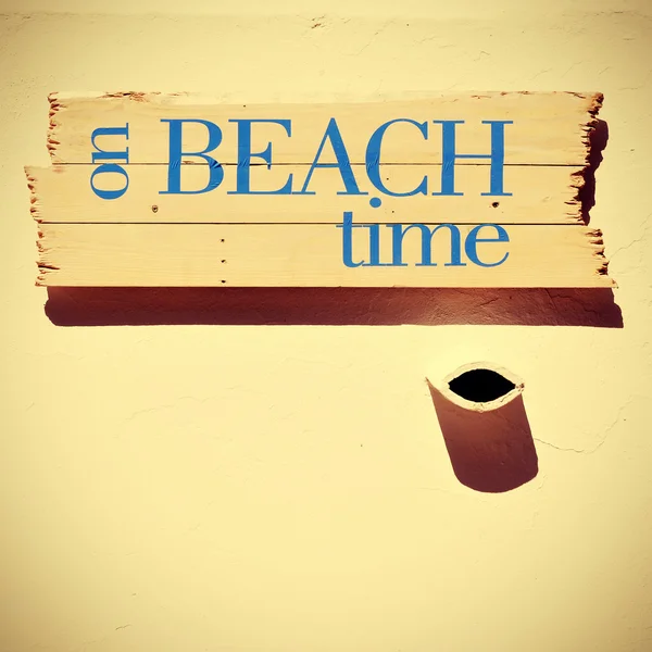 Signpost with the text on beach time, with a retro look — 图库照片