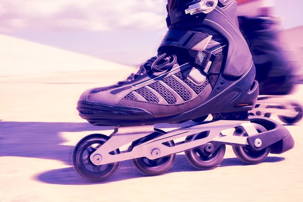 Young man roller skating, filtered — Stock Photo, Image