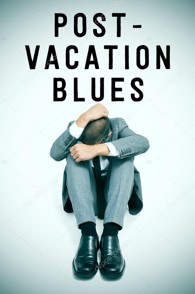 Text post-vacation blues and a businessman curled up