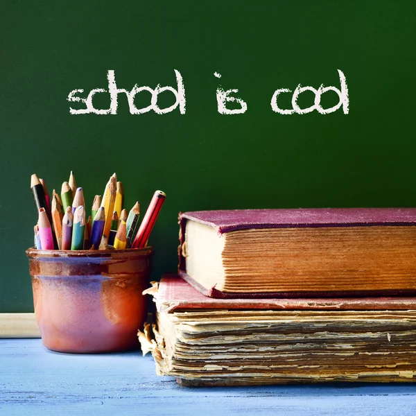 Text school is cool written in a chalkboard — Stock Photo, Image
