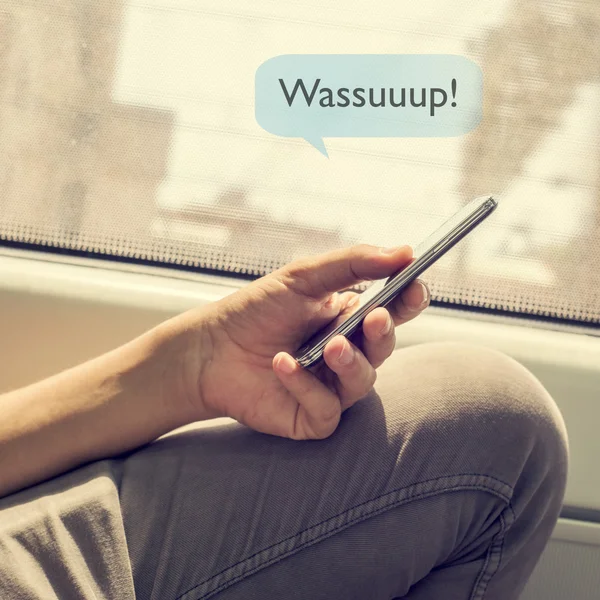 Young man sending a text message — Stock Photo, Image