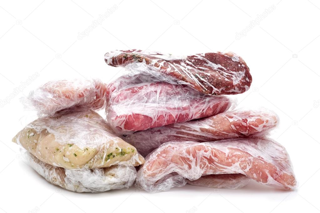 frozen raw meat wrapped in plastic