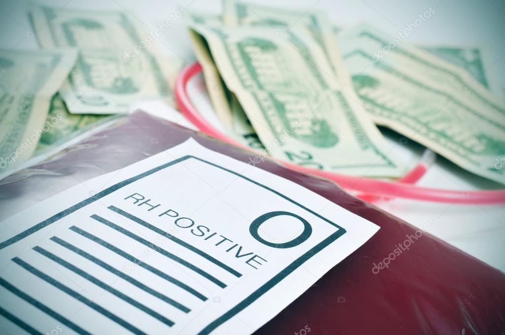 blood bag and US dollar bills
