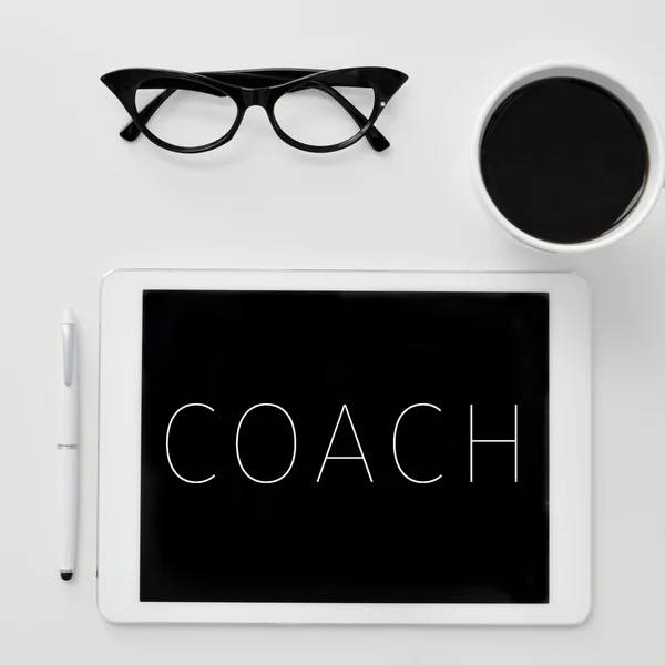 Word coach on the screen of a tablet computer — Stock Photo, Image