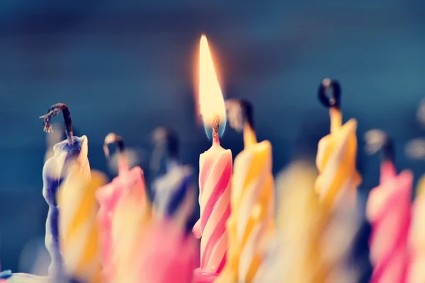 Closeup of some unlit candles — Stock Photo, Image