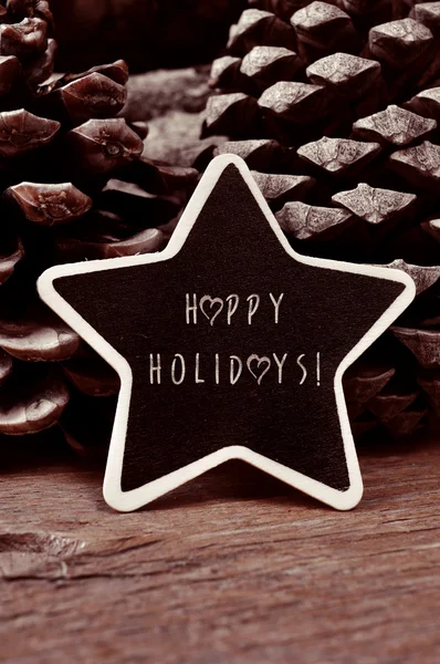 Yıldız şeklinde kara tahta ile metin mutlu tatiller — Stok fotoğraf
