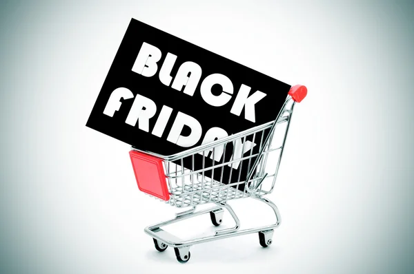 Signboard with the text black friday in a shopping cart, vignett — Stock Photo, Image