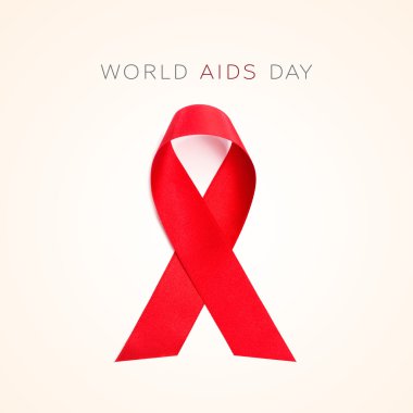 kırmızı kurdele ve metin Dünya AIDS günü