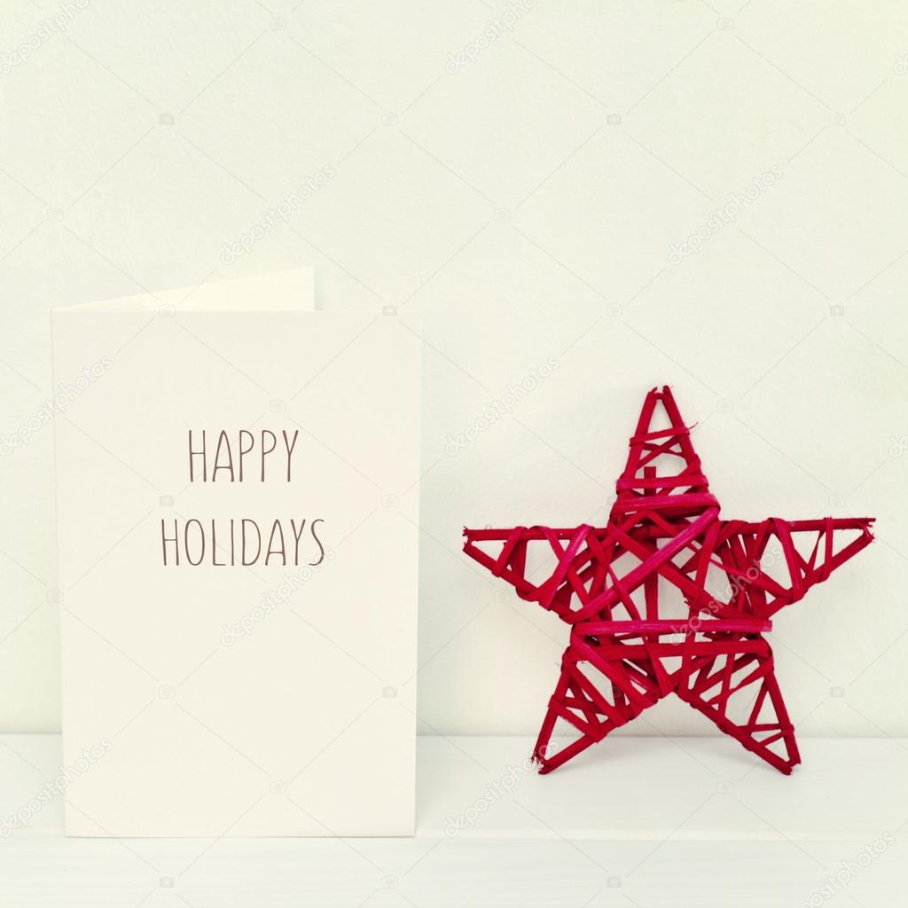 Christmas star and text happy holidays