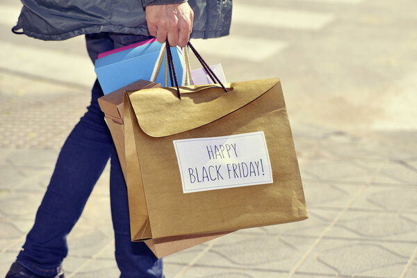 man with a bag with the text happy black friday