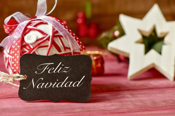 Text feliz navidad, frohe Weihnachten auf spanisch — Stockfoto