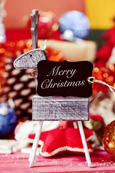 Christmas ornaments and text merry christmas — Stock Photo, Image